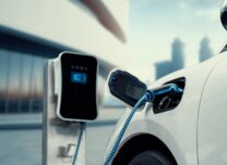 Innovative,Electric,Car,Connected,To,Charging,Station,With,Future,Architecture